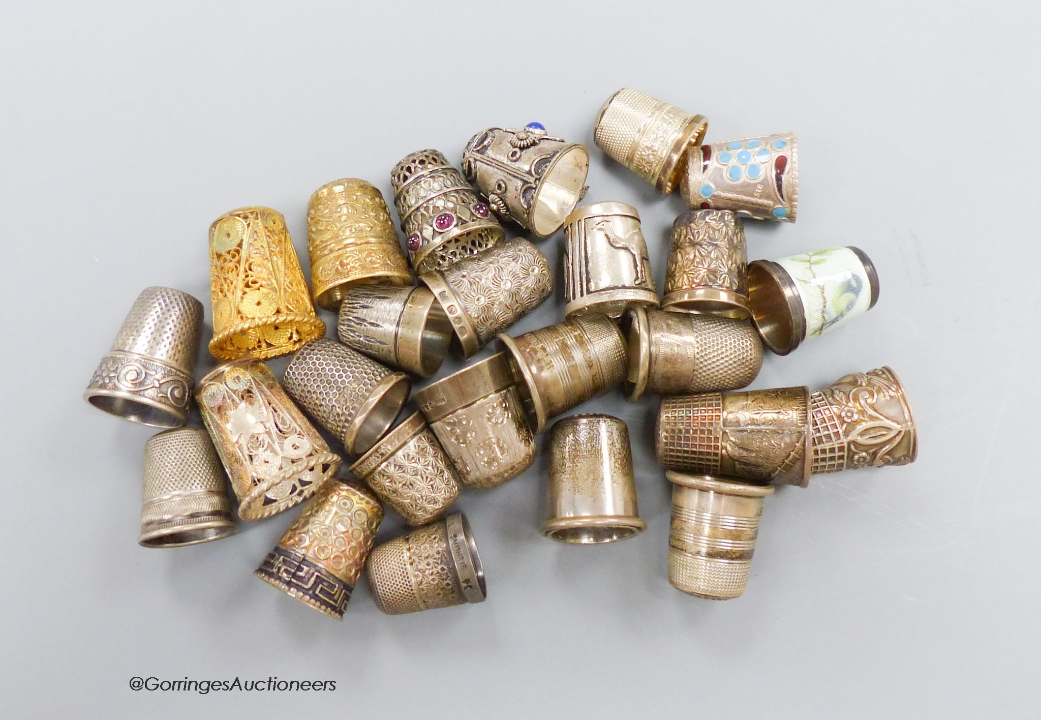 A collection of silver thimbles including a silver Charles Horner thimble